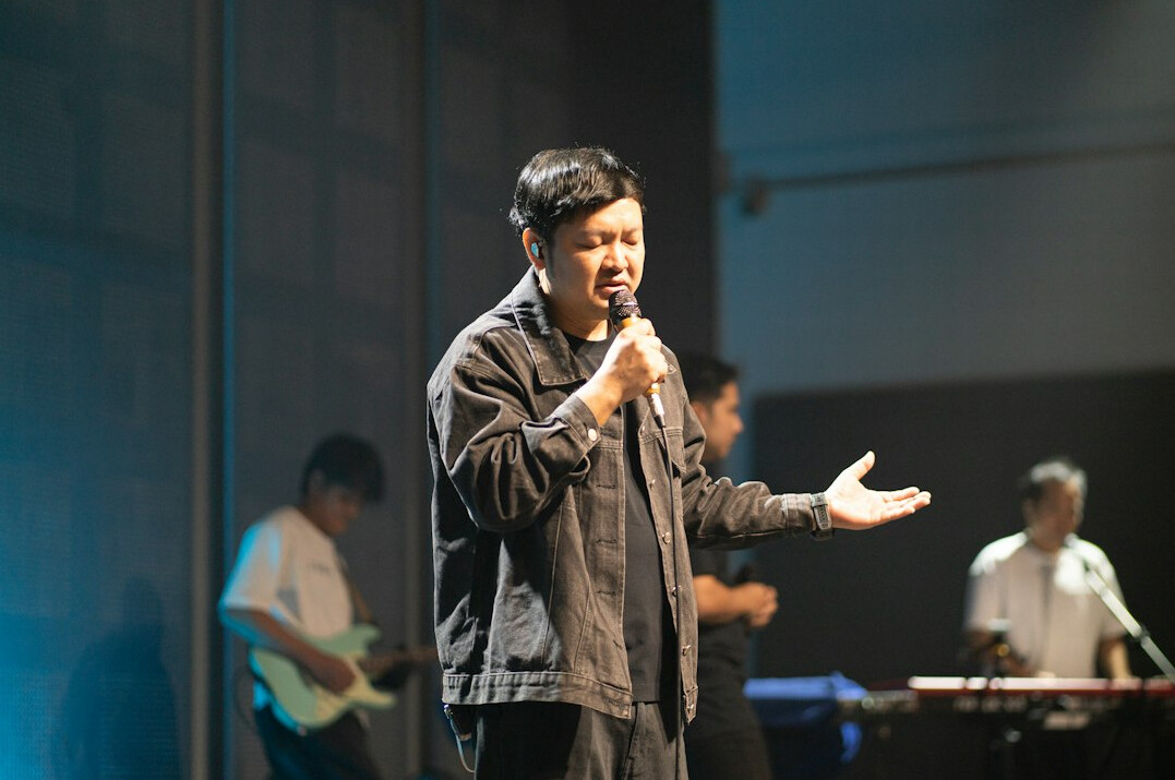 person speaking confidently on stage